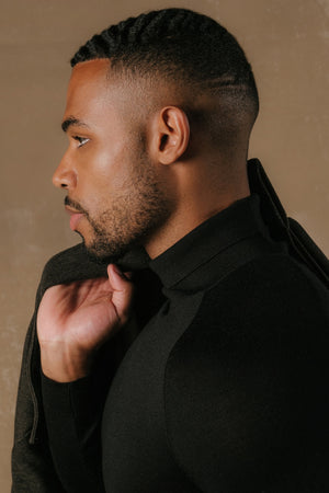 Extra Fine Merino Wool Roll Neck Jumper in Black