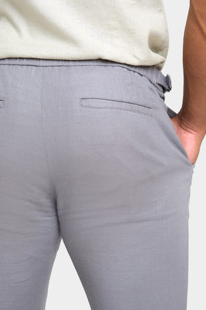 Linen Blend Cropped Pleated Trousers in Mole - TAILORED ATHLETE - ROW
