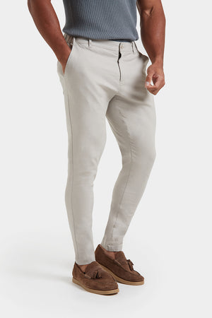 Linen-blend Trousers in Stone - TAILORED ATHLETE - ROW