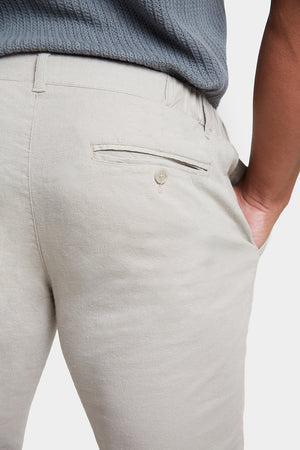 Linen-blend Trousers in Stone - TAILORED ATHLETE - ROW