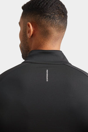 Training Quarter Zip in Black - TAILORED ATHLETE - ROW