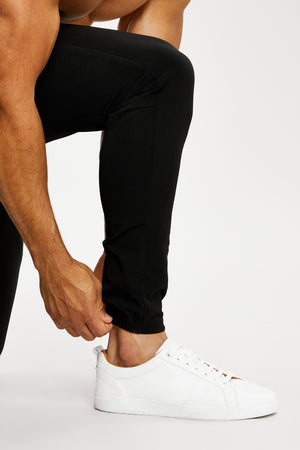 Everyday Tech Trousers in Black - TAILORED ATHLETE - ROW