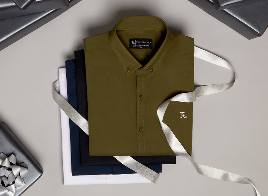 Flat lay showcasing muscle-fit shirts and trousers perfect for both performance and casual wear