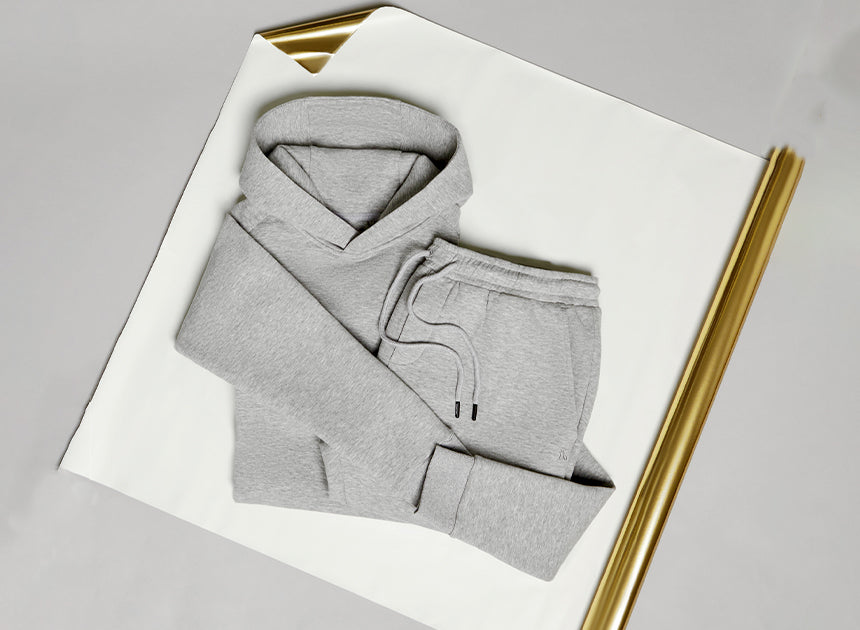 Flat lay image of tailored muscle-fit clothing combining sleek style and comfortable wear