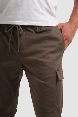 Cuffed Cargo Trousers in Dark Olive - TAILORED ATHLETE - ROW