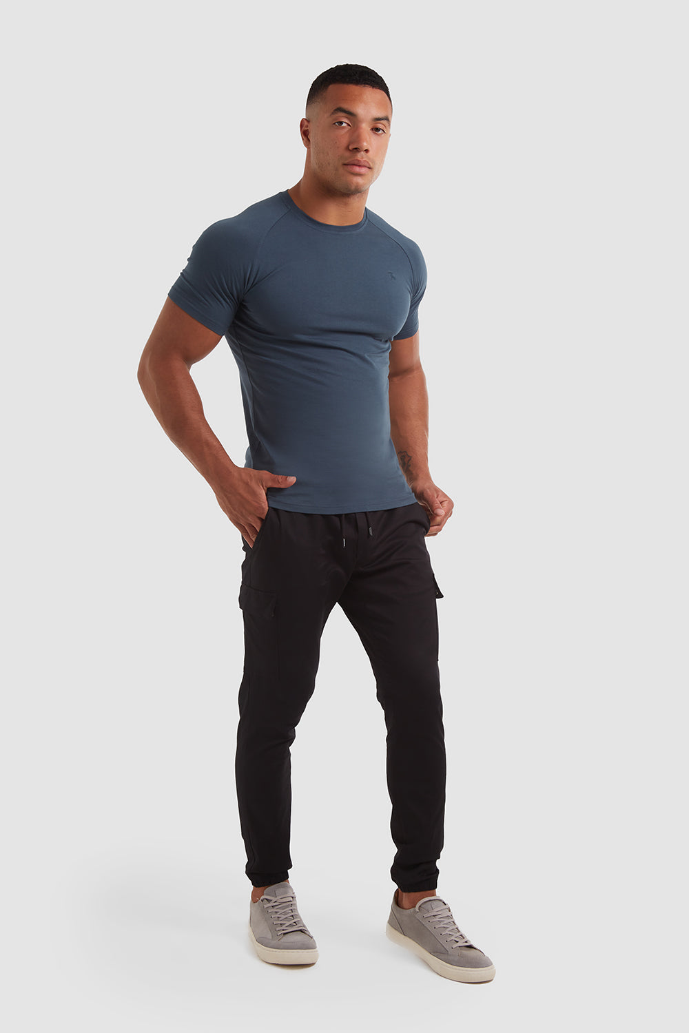 Cuffed Cargo Trousers in Black - TAILORED ATHLETE - ROW