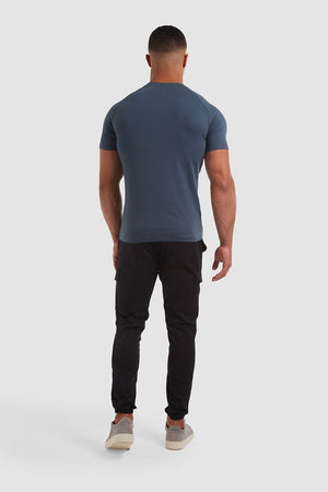 Cuffed Cargo Trousers in Black - TAILORED ATHLETE - ROW