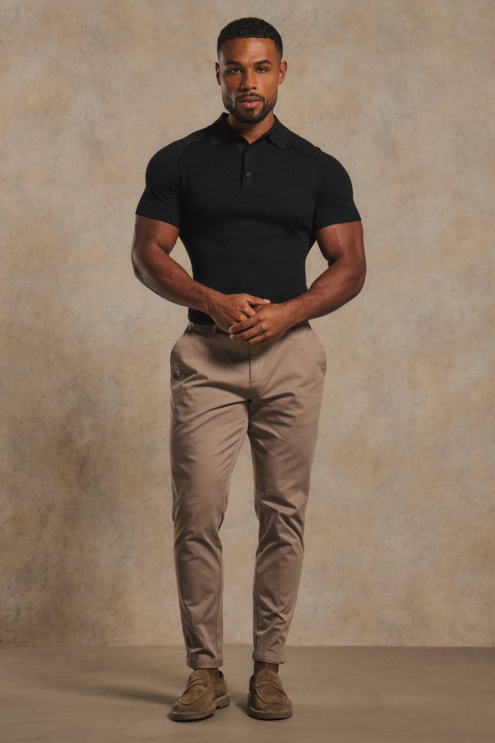 Mercerised Cotton Textured Knitted Polo Shirt in Black