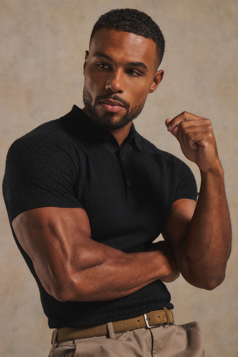 Mercerised Cotton Textured Knitted Polo Shirt in Black
