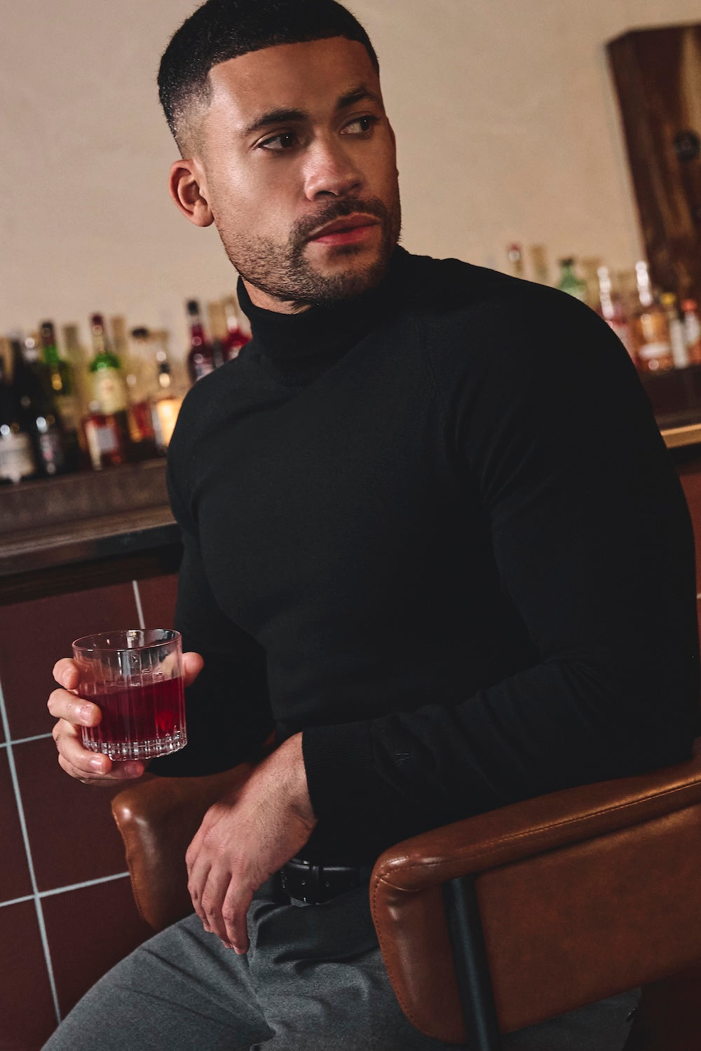 Cotton Blend Roll Neck Jumper in Black