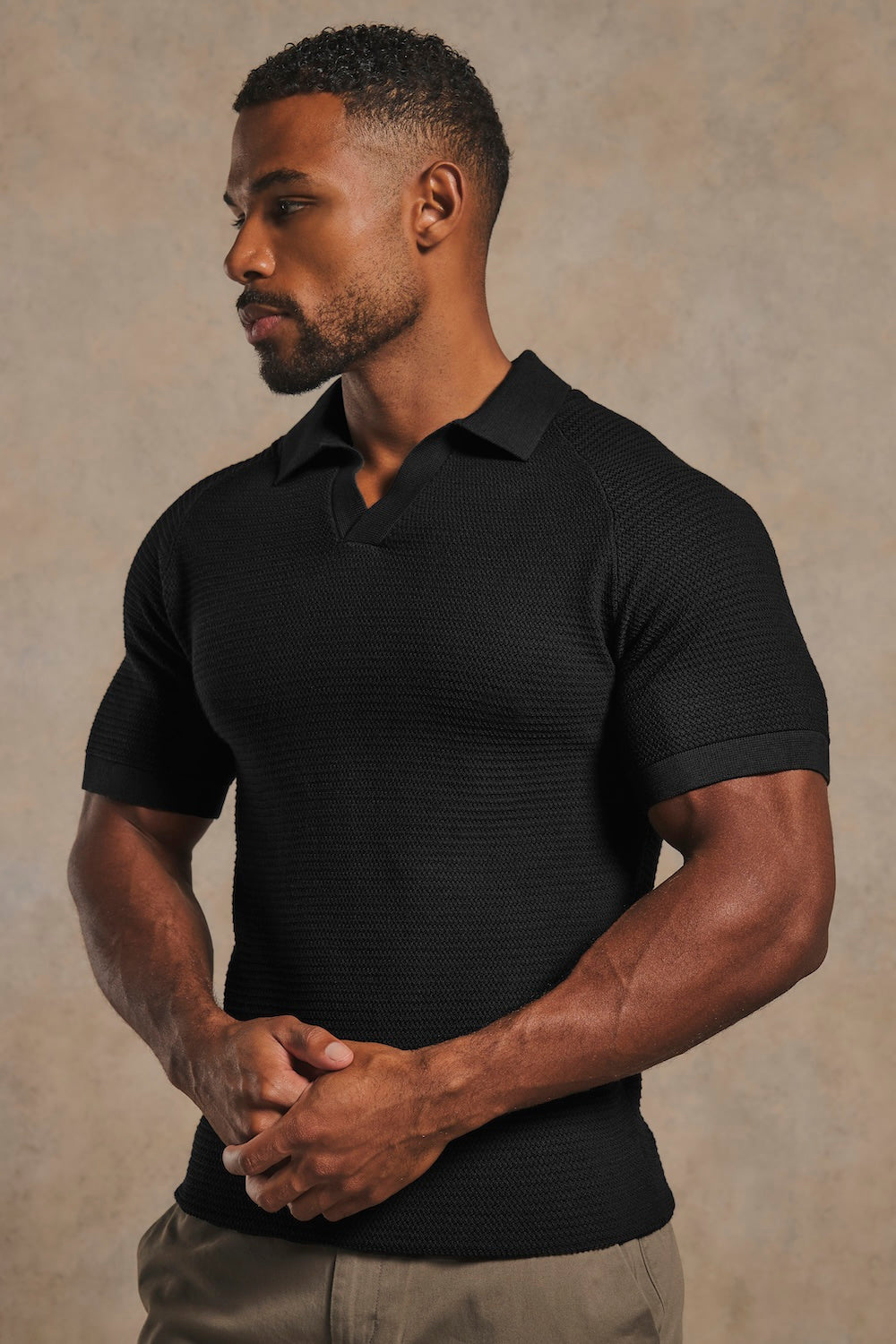 Textured Knitted Open Collar Polo Shirt in Black