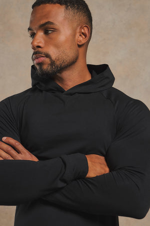 Muscle Fit Hooded Long Sleeve Top in Black
