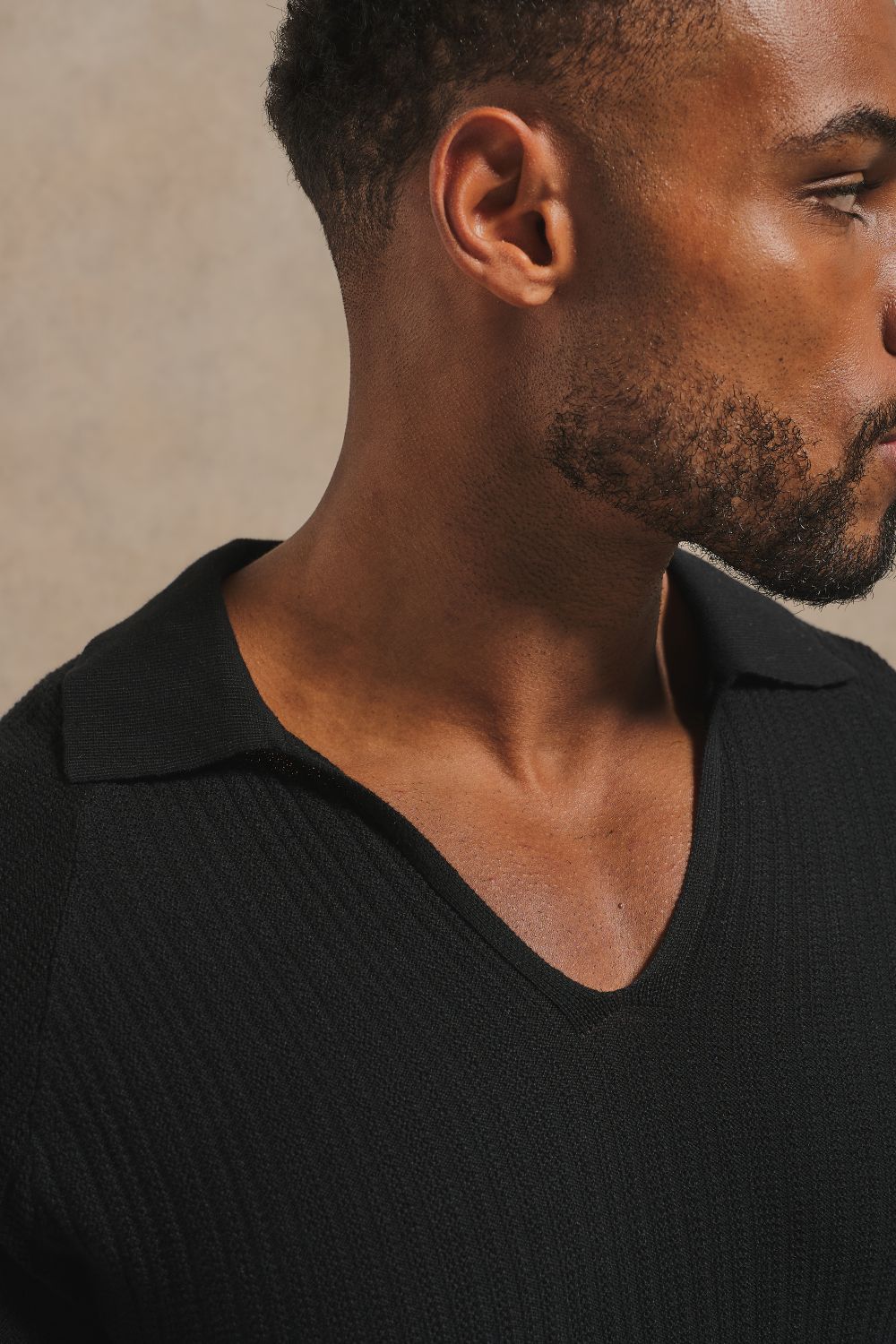 Textured Knitted V-Neck Open Collar Polo Shirt in Black