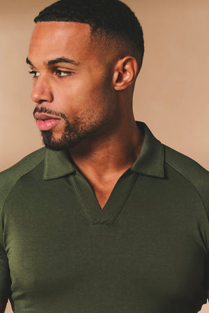 Essential Jersey Buttonless Polo Shirt in Forest Green
