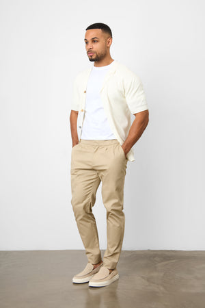 Smart Pleated Cotton Side Adjust Trouser in Stone - TAILORED ATHLETE - ROW