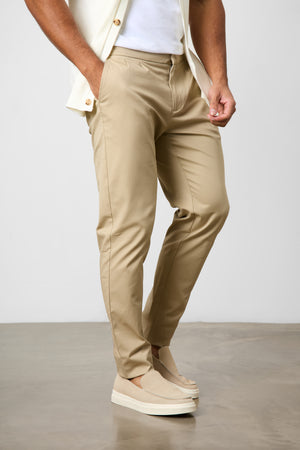 Smart Pleated Cotton Side Adjust Trouser in Stone - TAILORED ATHLETE - ROW