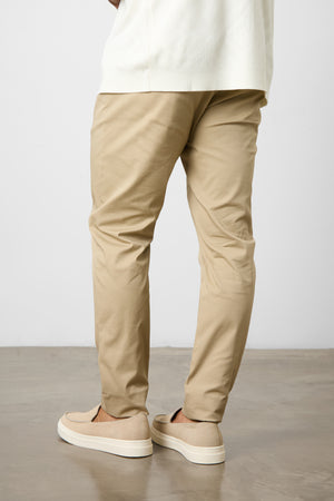 Smart Pleated Cotton Side Adjust Trouser in Stone - TAILORED ATHLETE - ROW