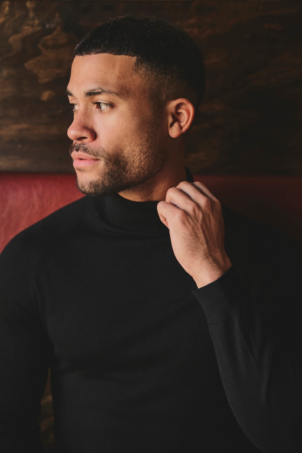 Extra Fine Merino Wool Roll Neck Jumper in Black