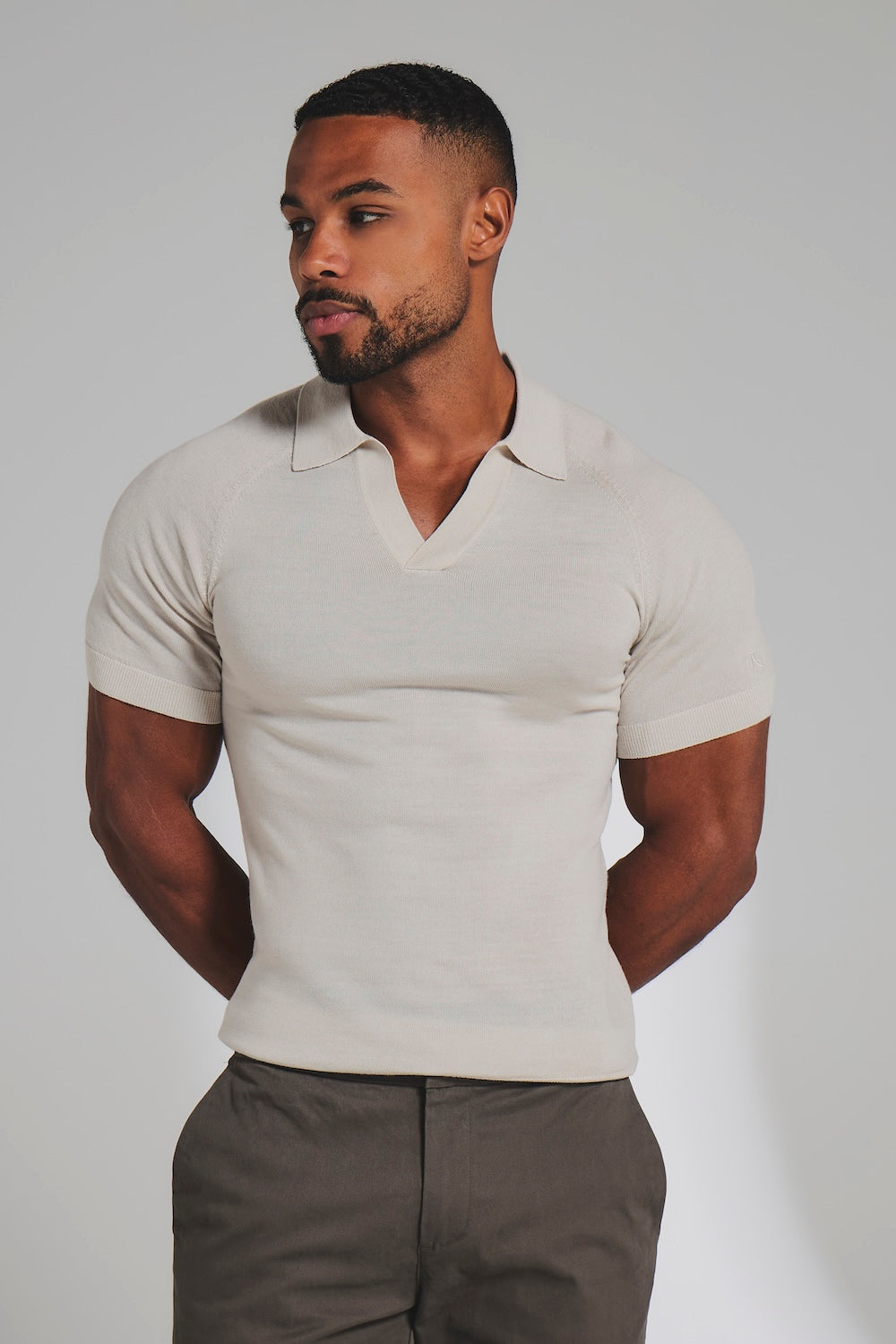 Extra Fine Merino Wool Knitted Open Collar Polo Shirt in Alabaster