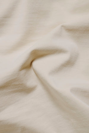 Essential Jersey Buttonless Polo Shirt in Alabaster