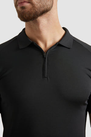 Performance Polo Shirt in Black - TAILORED ATHLETE - ROW