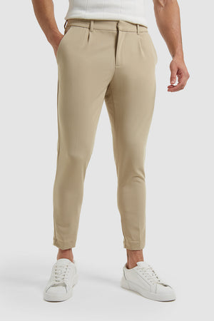 Cropped Pleated Trouser in Stone - TAILORED ATHLETE - ROW