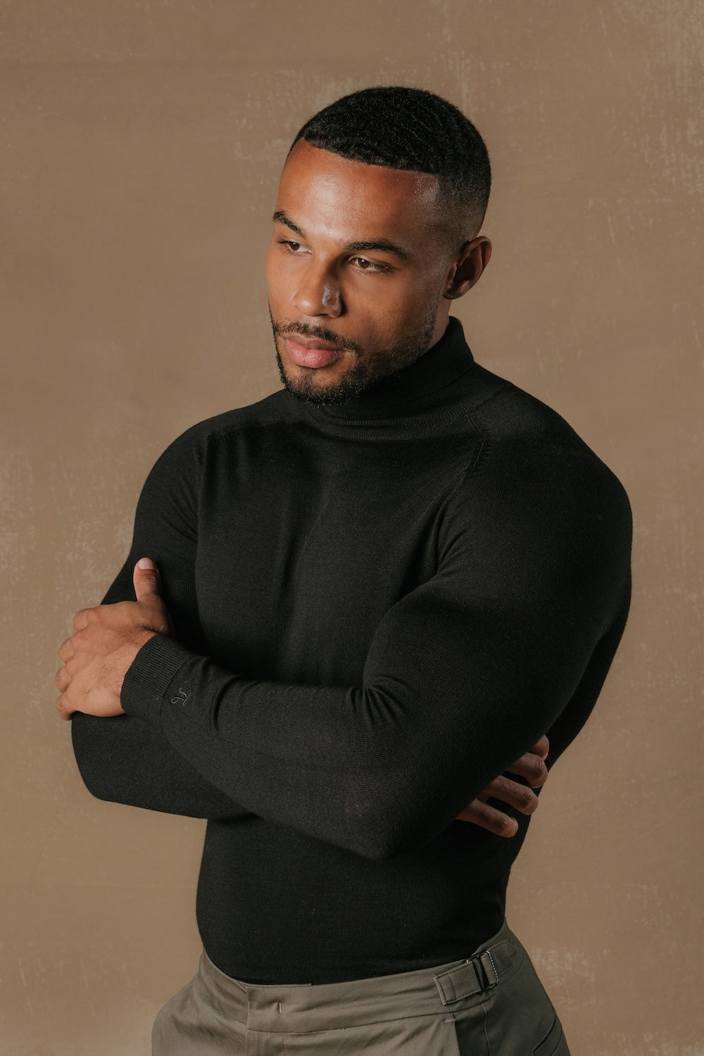 Extra Fine Merino Wool Roll Neck Jumper in Black