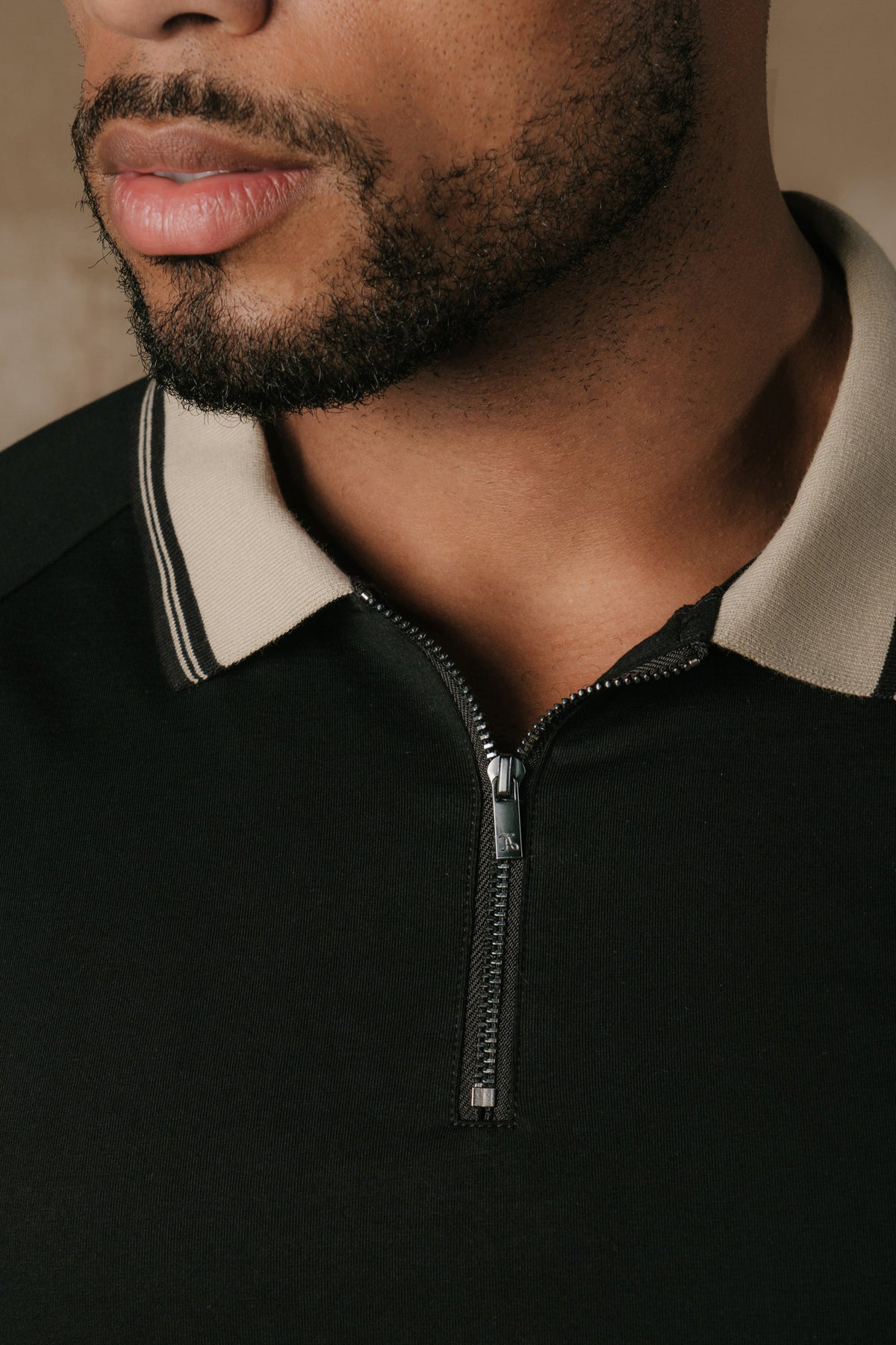 Tipped Zip Neck Polo in Black and Stone Tipping