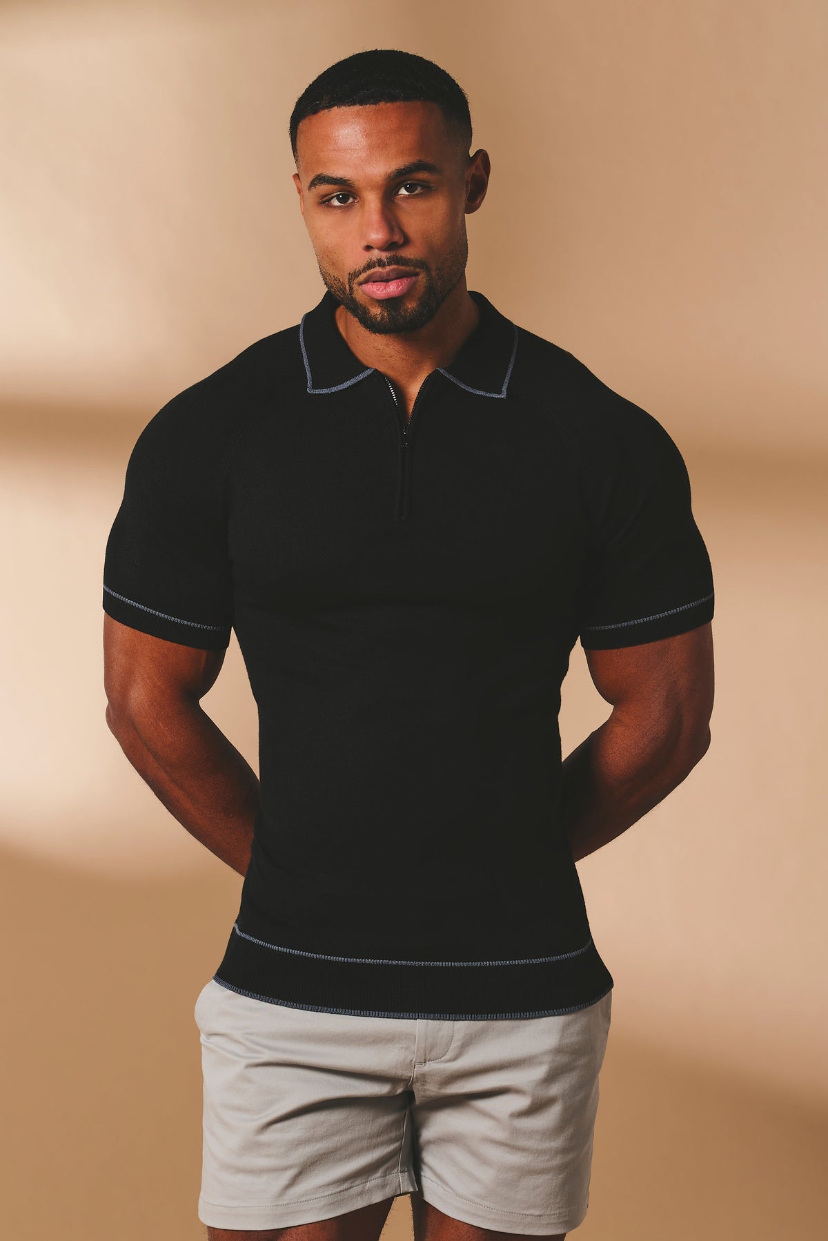 Tipped Knitted Zip Neck Polo Shirt in Black