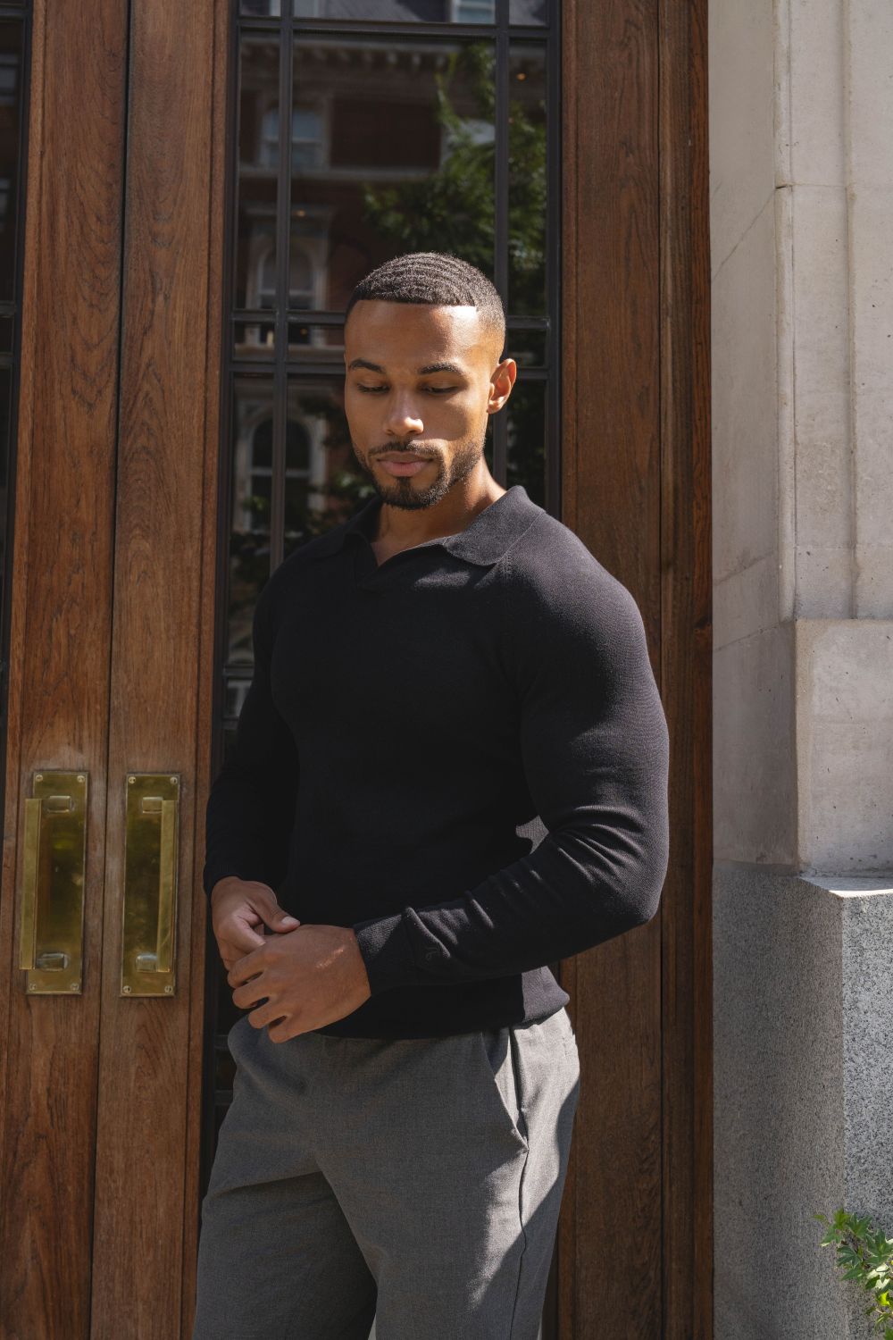 Open Collar Knitted Polo Shirt in Black