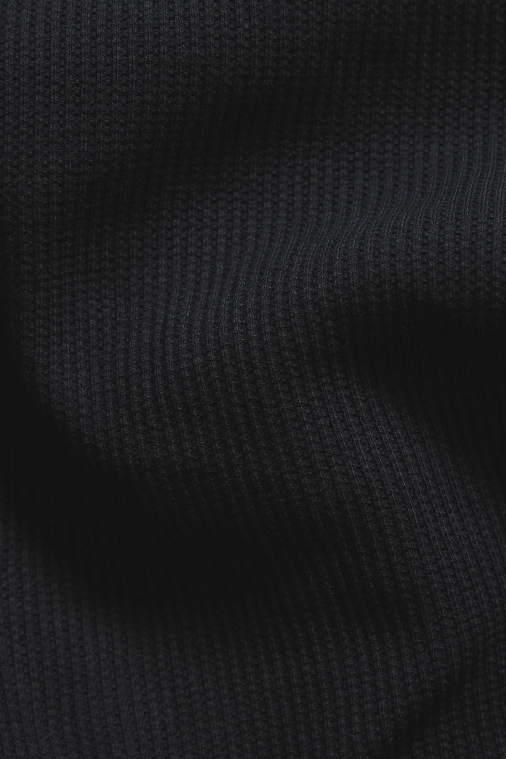 Textured Buttonless Polo Shirt in Black