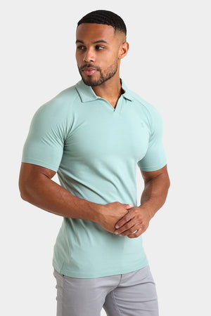 Buttonless Open Collar Polo Shirt in Soft Sage - TAILORED ATHLETE - ROW