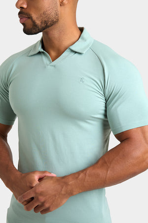 Buttonless Open Collar Polo Shirt in Soft Sage - TAILORED ATHLETE - ROW