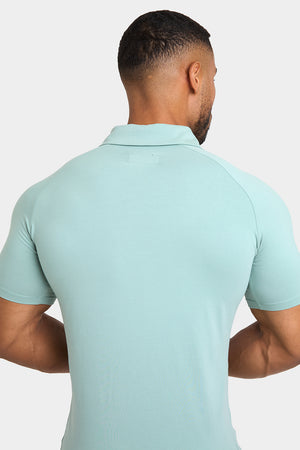 Buttonless Open Collar Polo Shirt in Soft Sage - TAILORED ATHLETE - ROW