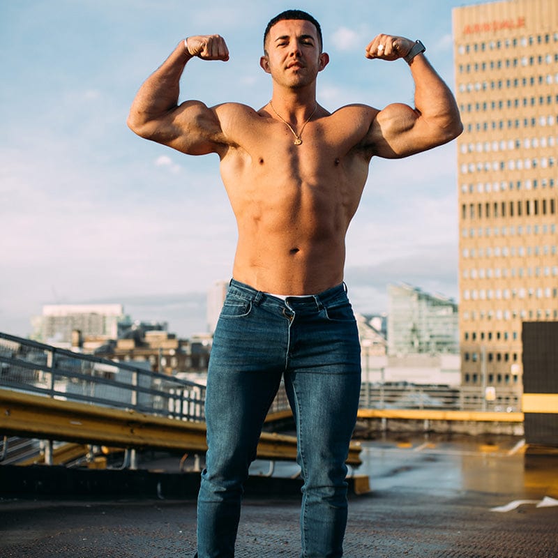Tailored denim jeans offering a sleek muscle fit designed for a modern and stylish look
