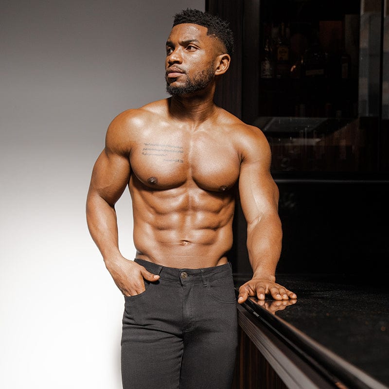 Stylish muscle-fit denim jeans designed to offer a perfect, comfortable fit for muscular bodies