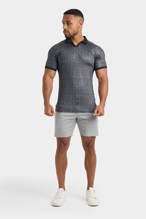 Printed Polo Shirt in Black Doodle Geo - TAILORED ATHLETE - ROW