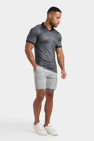 Printed Polo Shirt in Black Doodle Geo - TAILORED ATHLETE - ROW