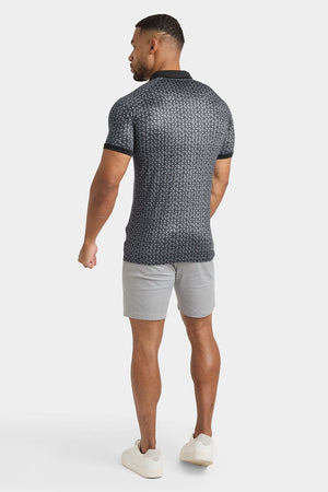 Printed Polo Shirt in Black Doodle Geo - TAILORED ATHLETE - ROW