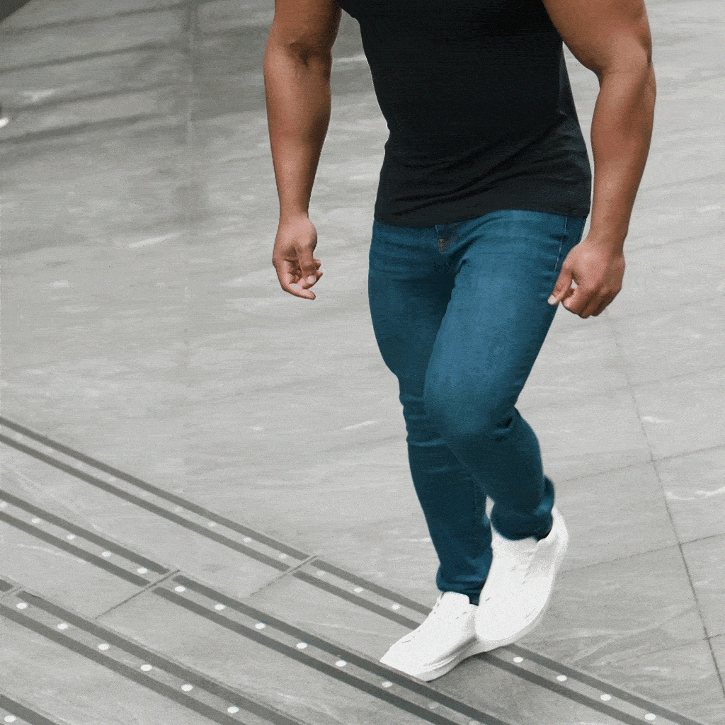 GIF demonstrating the flexibility and comfort of muscle-fit denim jeans in active movement