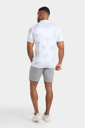 Printed Polo Shirt in White Faded Palms - TAILORED ATHLETE - ROW