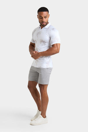 Printed Polo Shirt in White Faded Palms - TAILORED ATHLETE - ROW