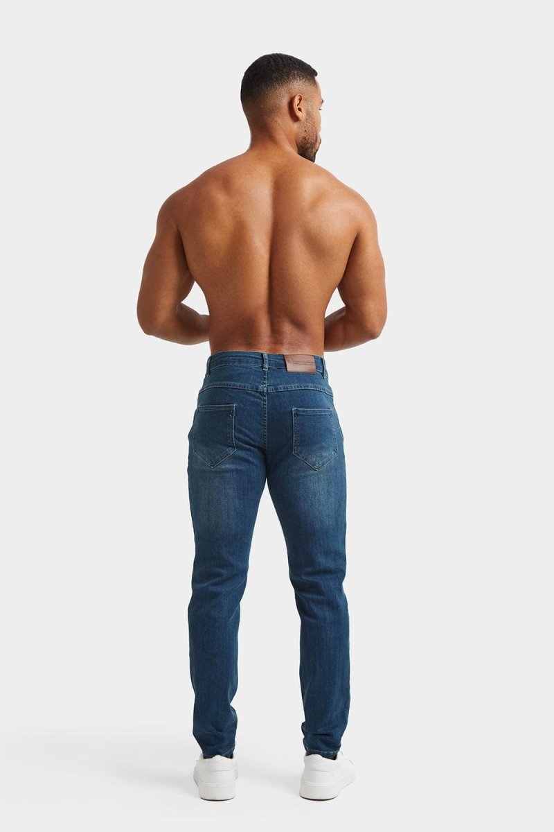 Muscle Fit Jeans in Mid Blue