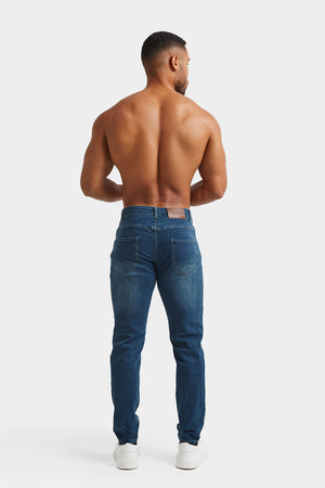 Muscle Fit Jeans in Mid Blue - TAILORED ATHLETE - ROW