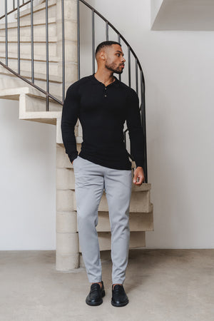Knitted Polo Shirt in Black - TAILORED ATHLETE - ROW