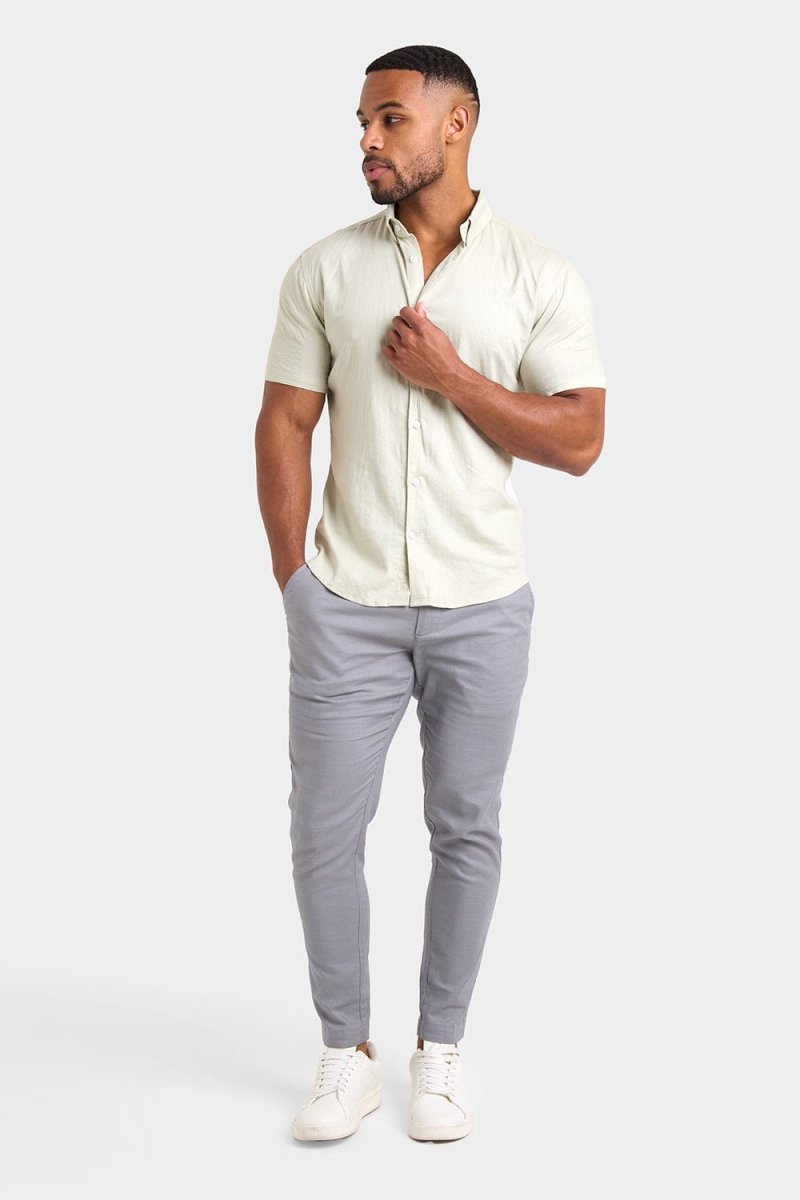 Linen Blend Cropped Pleated Trousers in Mole - TAILORED ATHLETE - ROW