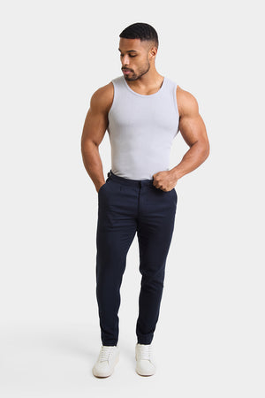Linen Blend Cropped Pleated Trousers in Navy - TAILORED ATHLETE - ROW
