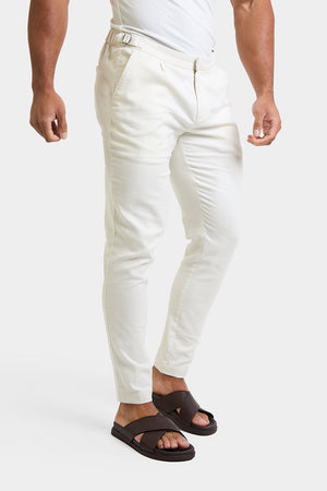Linen Blend Cropped Pleated Trousers in Chalk - TAILORED ATHLETE - ROW