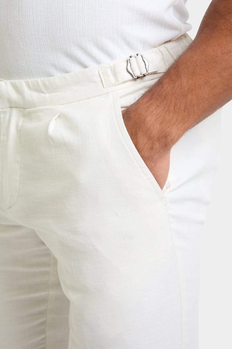 Linen Blend Cropped Pleated Trousers in Chalk - TAILORED ATHLETE - ROW