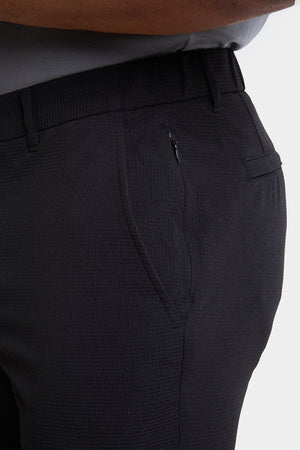 Performance Chino Trouser in Black - TAILORED ATHLETE - ROW
